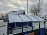 Sneeuwlaag bedekt sportpark 'Het Springer' (14/37)